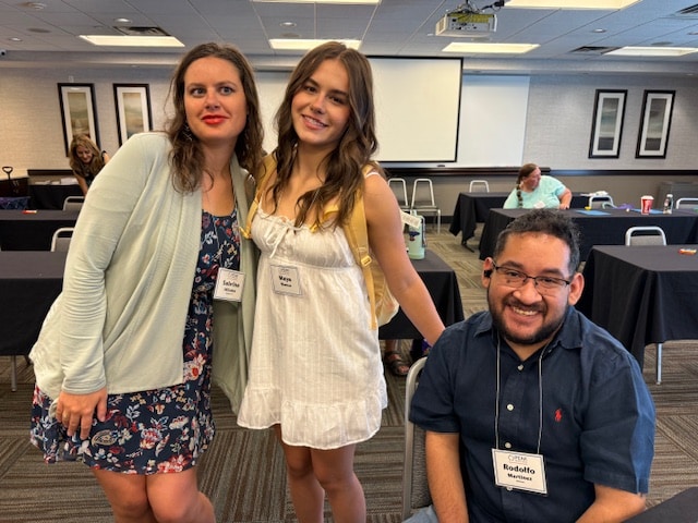YAC members smiling at conference
